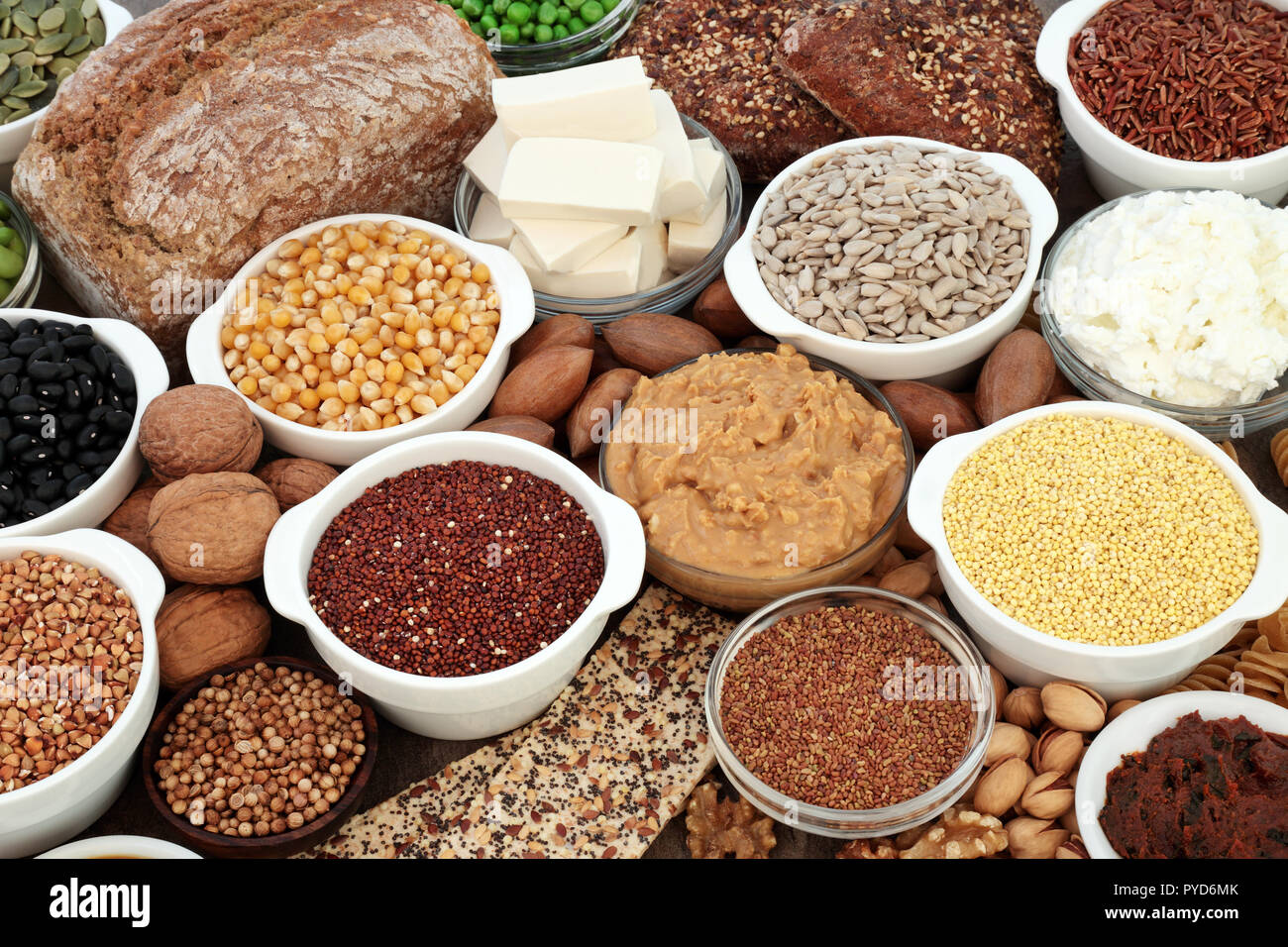 Vegan health food with tofu bean curd, legumes, nuts, seeds, cereals