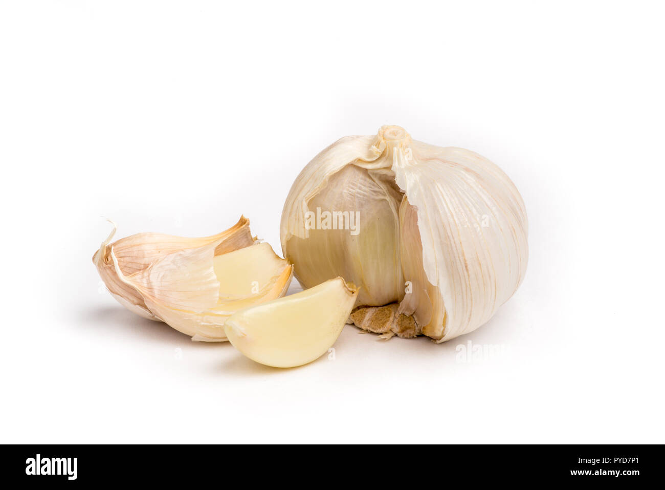 Fresh organic garlic cloves on white background Stock Photo