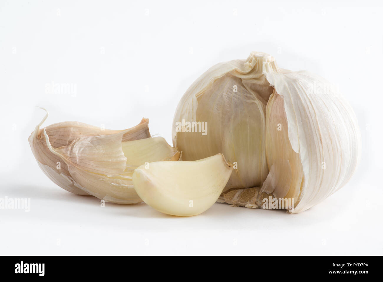 Fresh organic garlic cloves on white background Stock Photo - Alamy