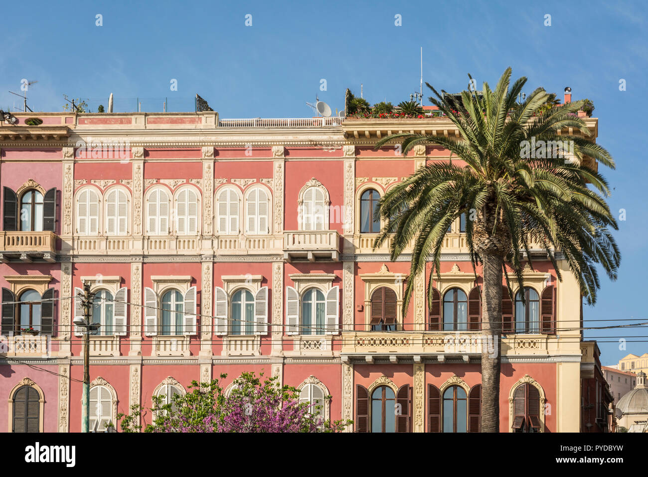 Fine buildings of Via Roma on the sea-front at Cagliari, Sardinia, Italy Stock Photo