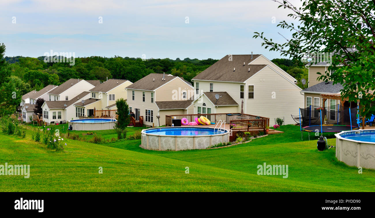 Modern residential neighbourhood with houses backing onto green grass in Canandaigua, NY, USA Stock Photo
