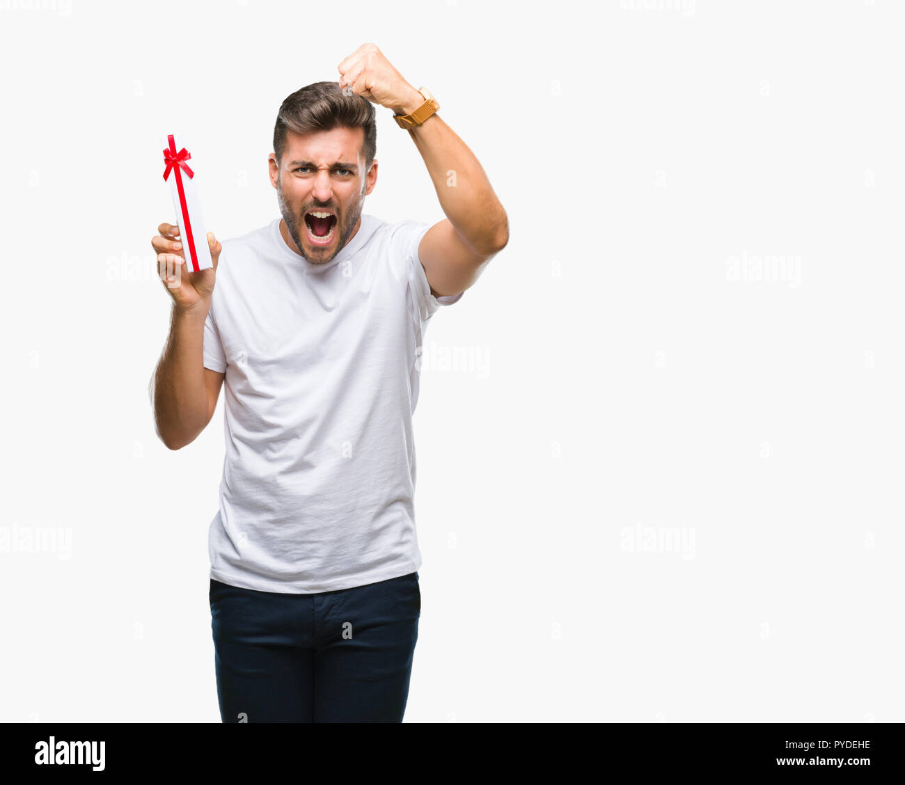 Man Raging Out Gift Young handsome man in love giving valentine present over isolated ...