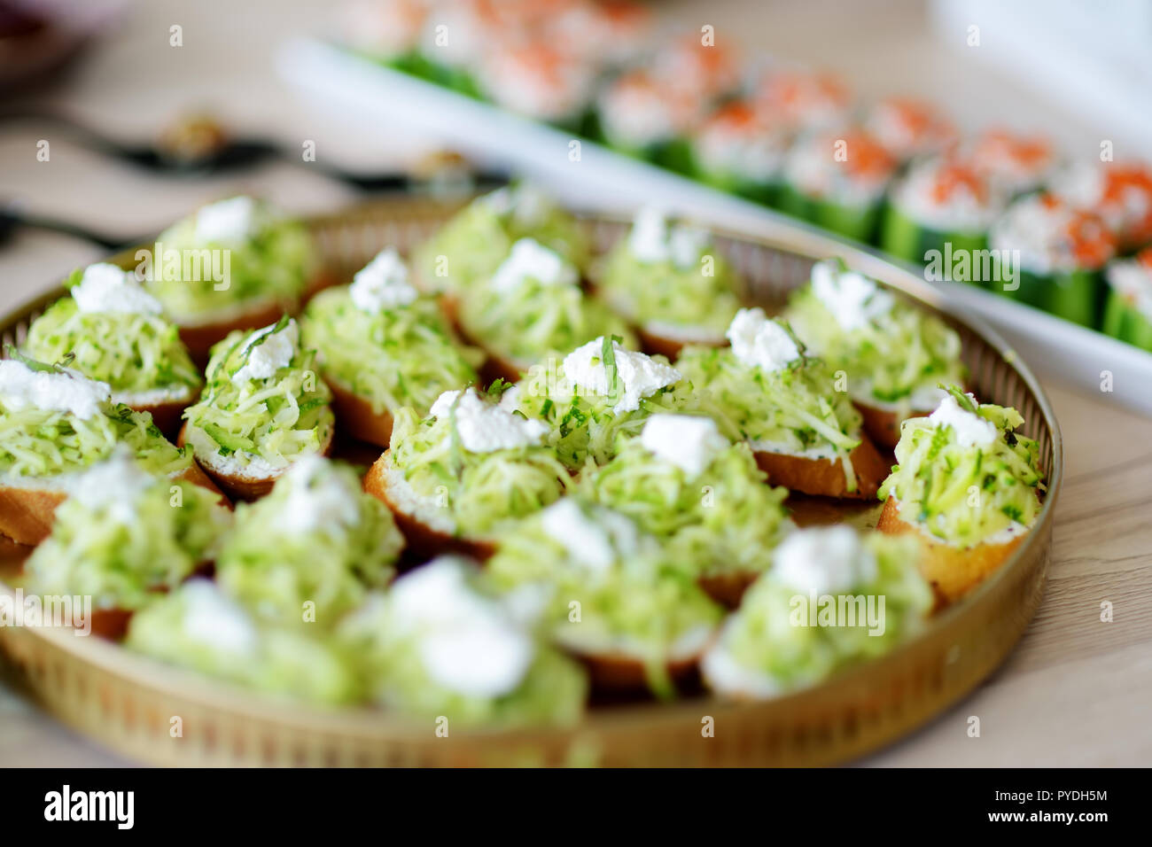 Delicious zucchini and mint mini bruschettas served on a party or ...
