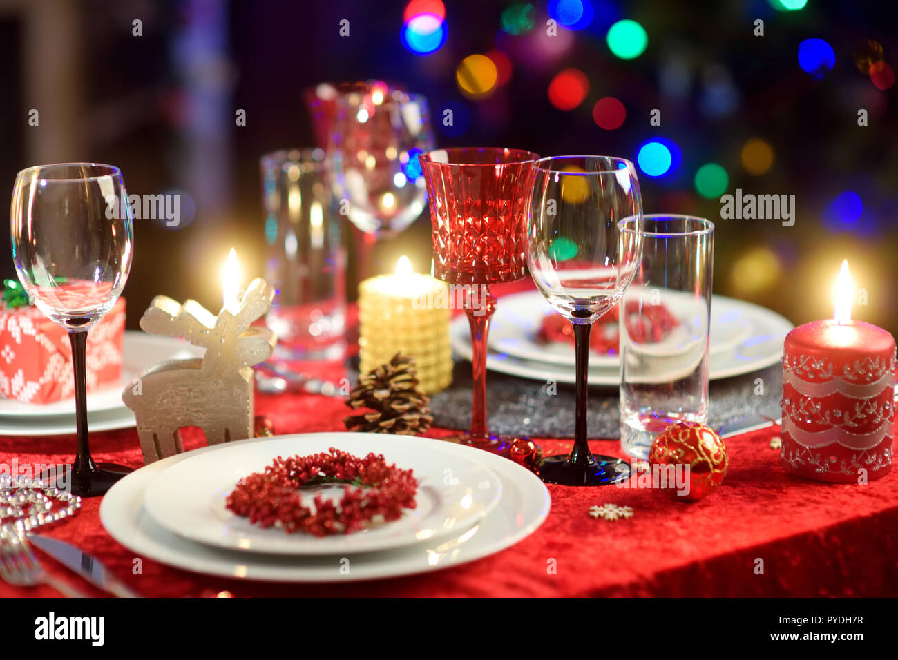 Beautiful table setting for Christmas party or New Year celebration at