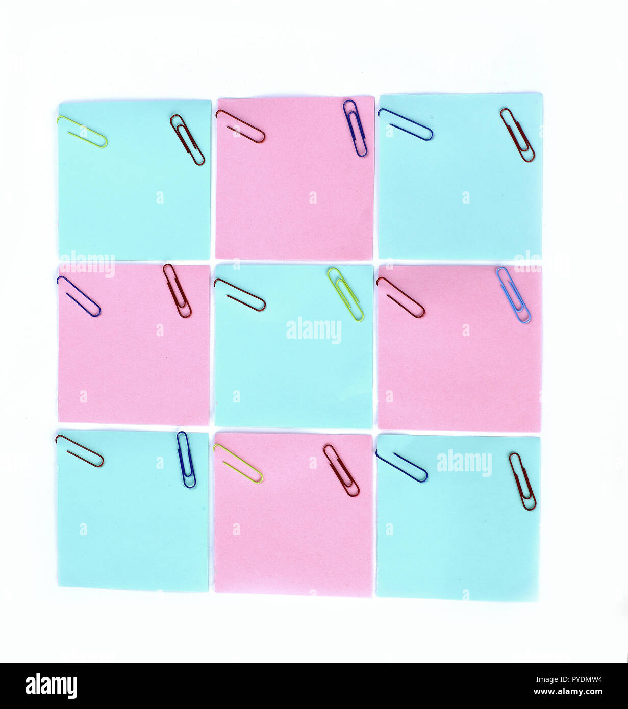 multiple blank sheets for notes with paper clips isolated on whi Stock Photo