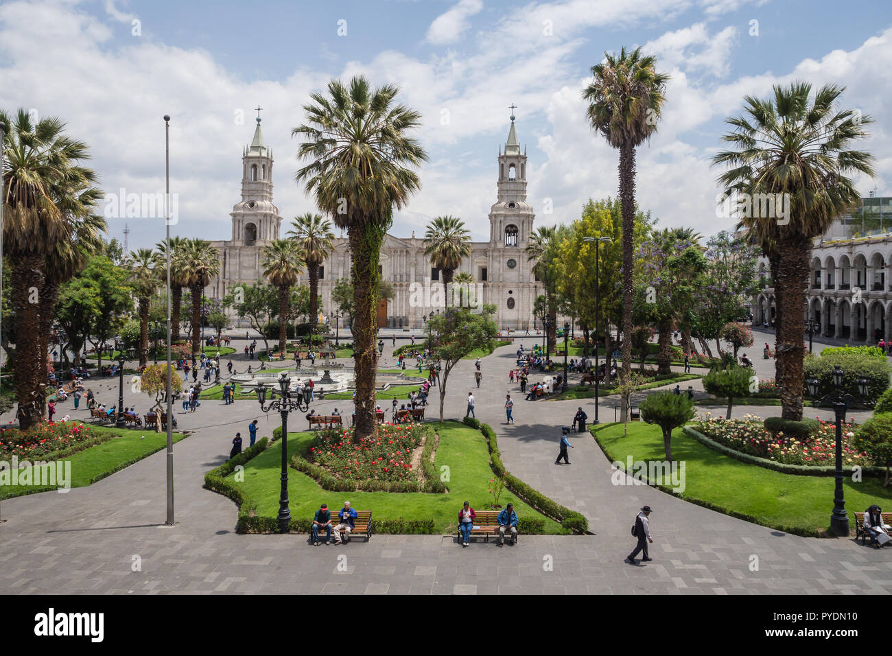 Arequipa city main square and cathedral. Palm and people relaxing and walking Stock Photo