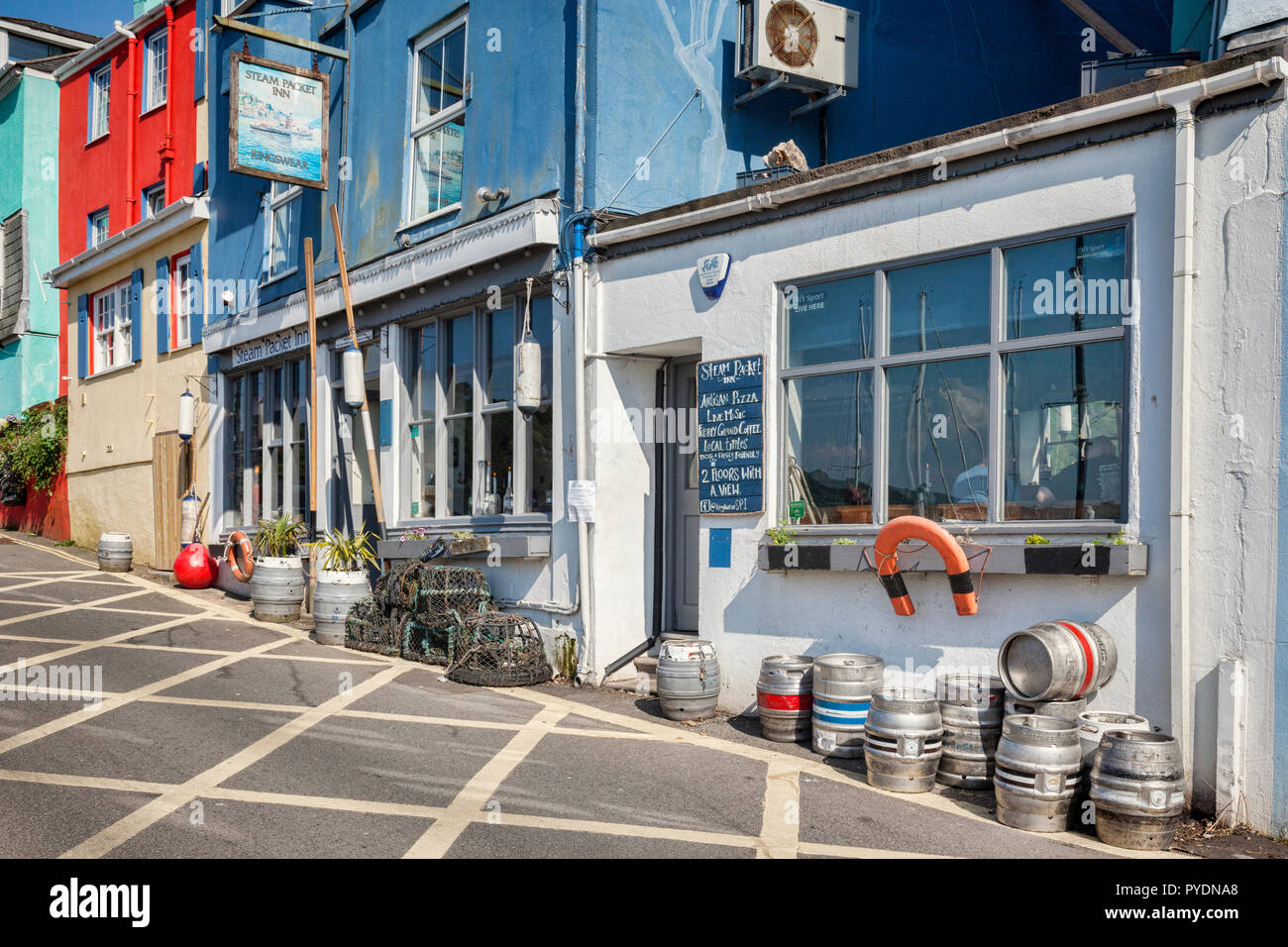 23 May 2018: Kingswear, Devon, UK - The Steam Packet Inn in Fore Street, where it overlooks the River Dart. Stock Photo