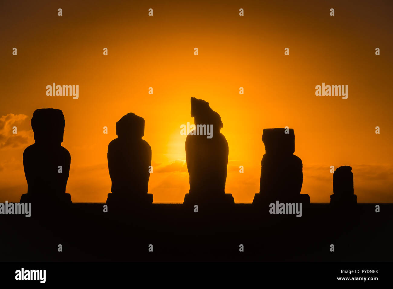 Backlighting sunset in Ahu Tahai, Easter Island. Moais in Rapa Nui Stock Photo