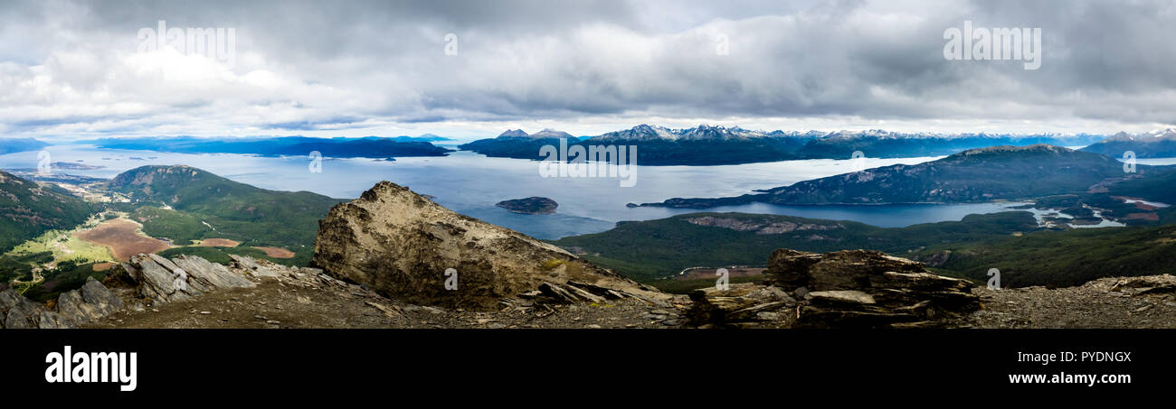 Panoramic of the Beagle Channel and Ushuaia in the left. The Tierra del Fuego National Park is In the rigth part. Argentina, Patagonia. The islands in Stock Photo