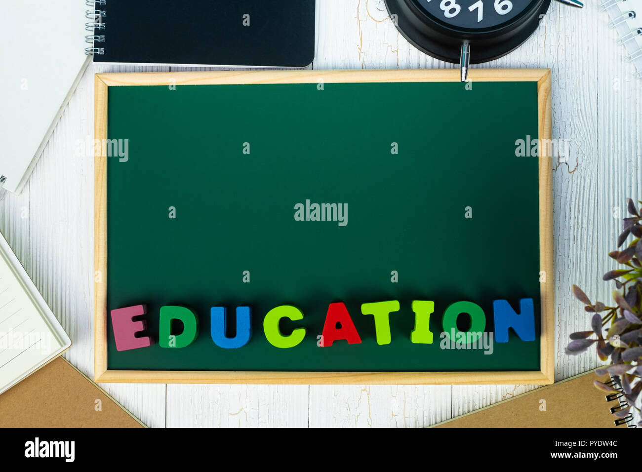 Back to school concept idea, Education text and green chalkboard with ...