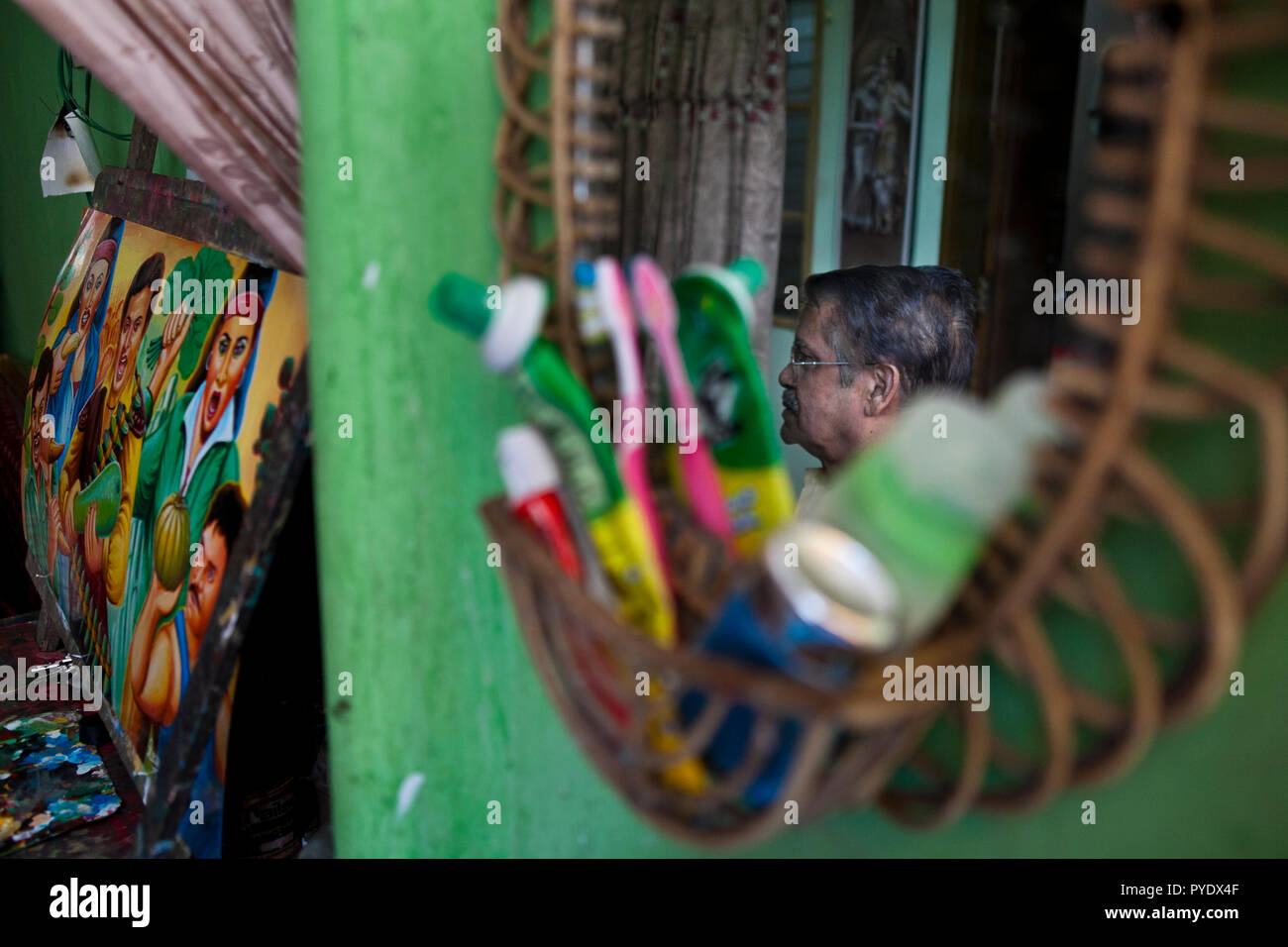 Raj Kumar Das, best known as RK Das, one of the first generation rickshaw artists in Bangladesh, is at his studio in capital Dhaka, on May 8, 2012. Th Stock Photo