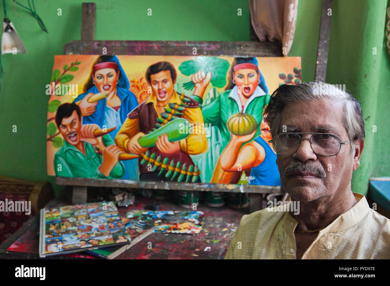 Raju Kumar Das, best known as RK Das, one of the first generation rickshaw artists in Bangladesh, is at his studio in capital Dhaka, on May 8, 2012. T Stock Photo