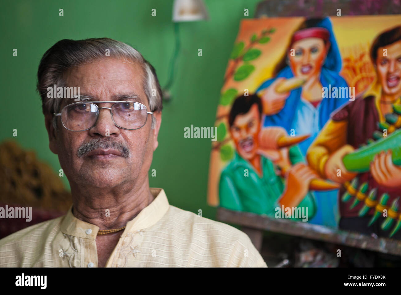 Raju Kumar Das, best known as RK Das, one of the first generation rickshaw artists in Bangladesh, is at his studio in capital Dhaka, on May 8, 2012. T Stock Photo