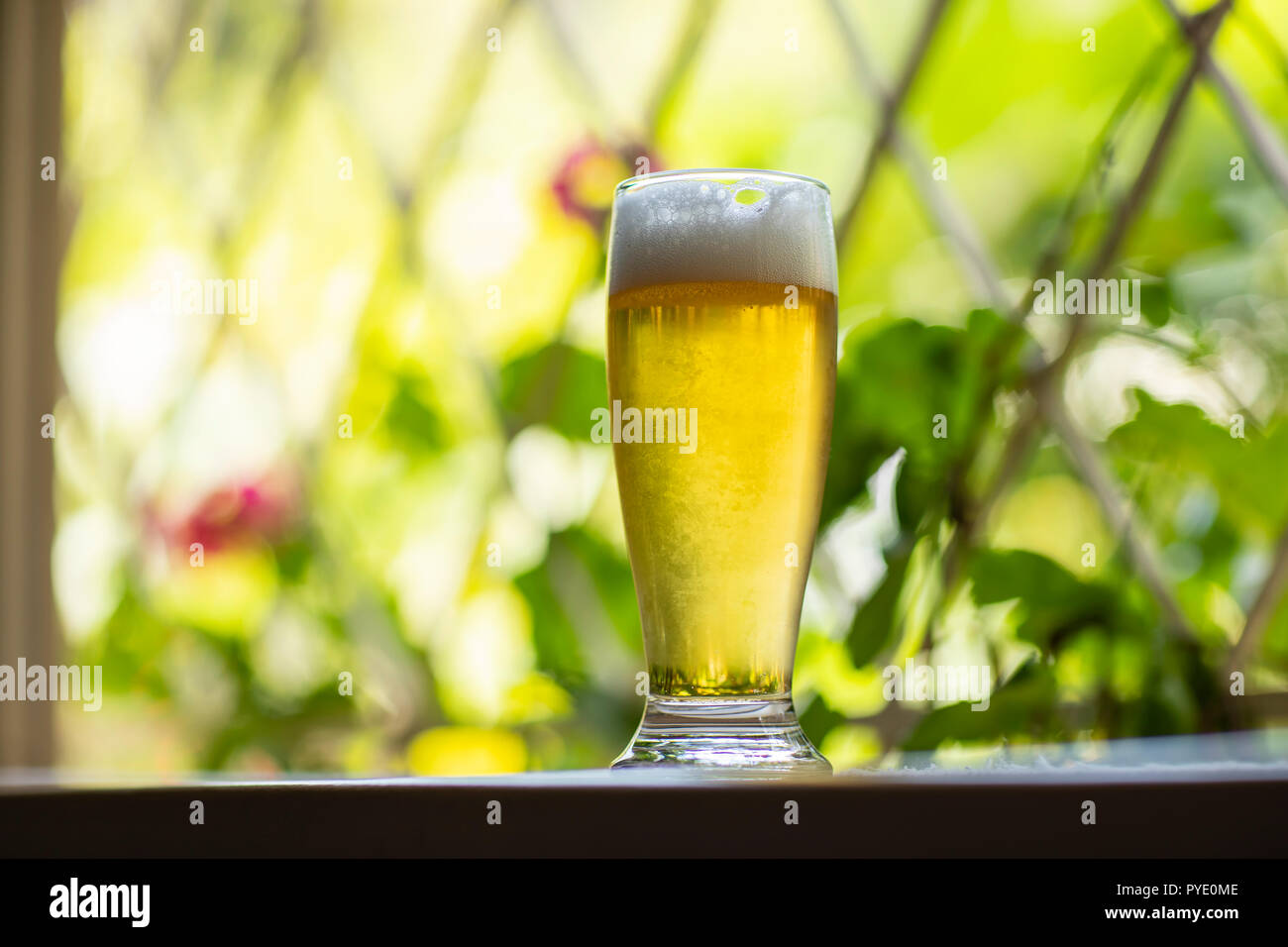 Beer in the window Stock Photo - Alamy