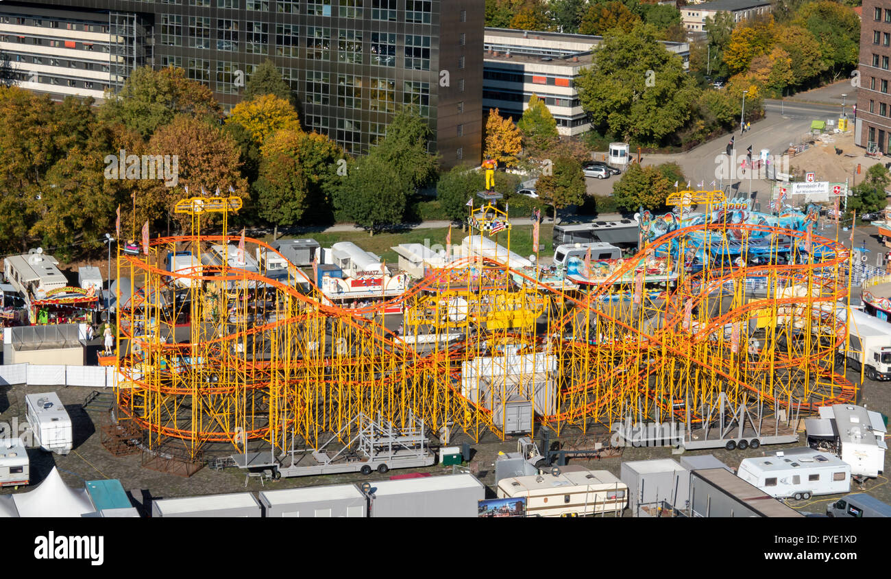 Honnover, Lower Saxony, Germany, October 13., 2018: View of the roller coaster at the Oktoberfest from a great height, general view from above, aerial Stock Photo