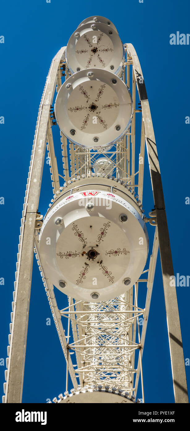 Honnover, Lower Saxony, Germany, October 13., 2018: Close-up view of the white cabin of a Ferris wheel from below Stock Photo