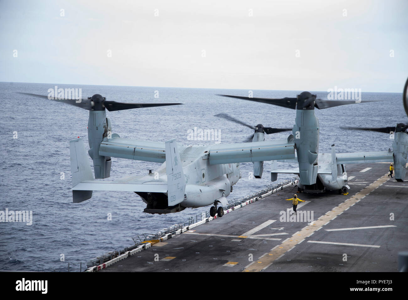 An MV-22 Osprey with Marine Medium Tiltrotor Squadron 264, 22nd Marine Expeditionary Unit (MEU), departs the USS Kearsarge (LHD 3) during the Carrier Strike Group (CSG) 4 composite training unit exercise (COMPTUEX) aboard the Wasp-class amphibious assault ship USS Kearsarge (LHD 3), Oct. 18, 2018. COMPTUEX is the final pre-deployment exercise that certifies the combined Kearsarge Amphibious Ready Group (ARG) and 22nd Marine Expeditionary Unit’s (MEU) abilities to conduct military operations at sea and project power ashore through joint planning and execution of challenging and realistic scenar Stock Photo