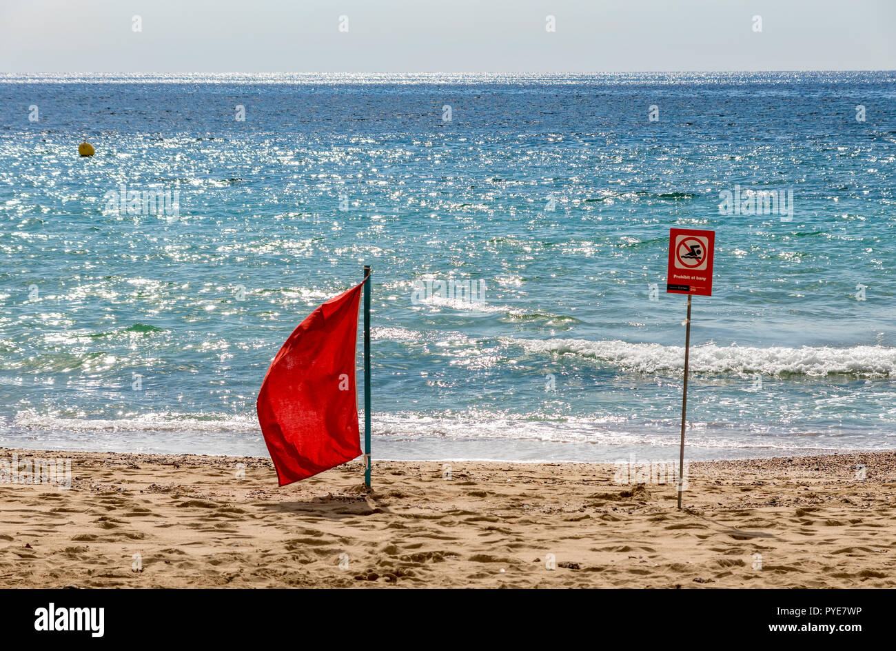 No swimming red flag on the beach - Mallorca, Spain Stock Photo