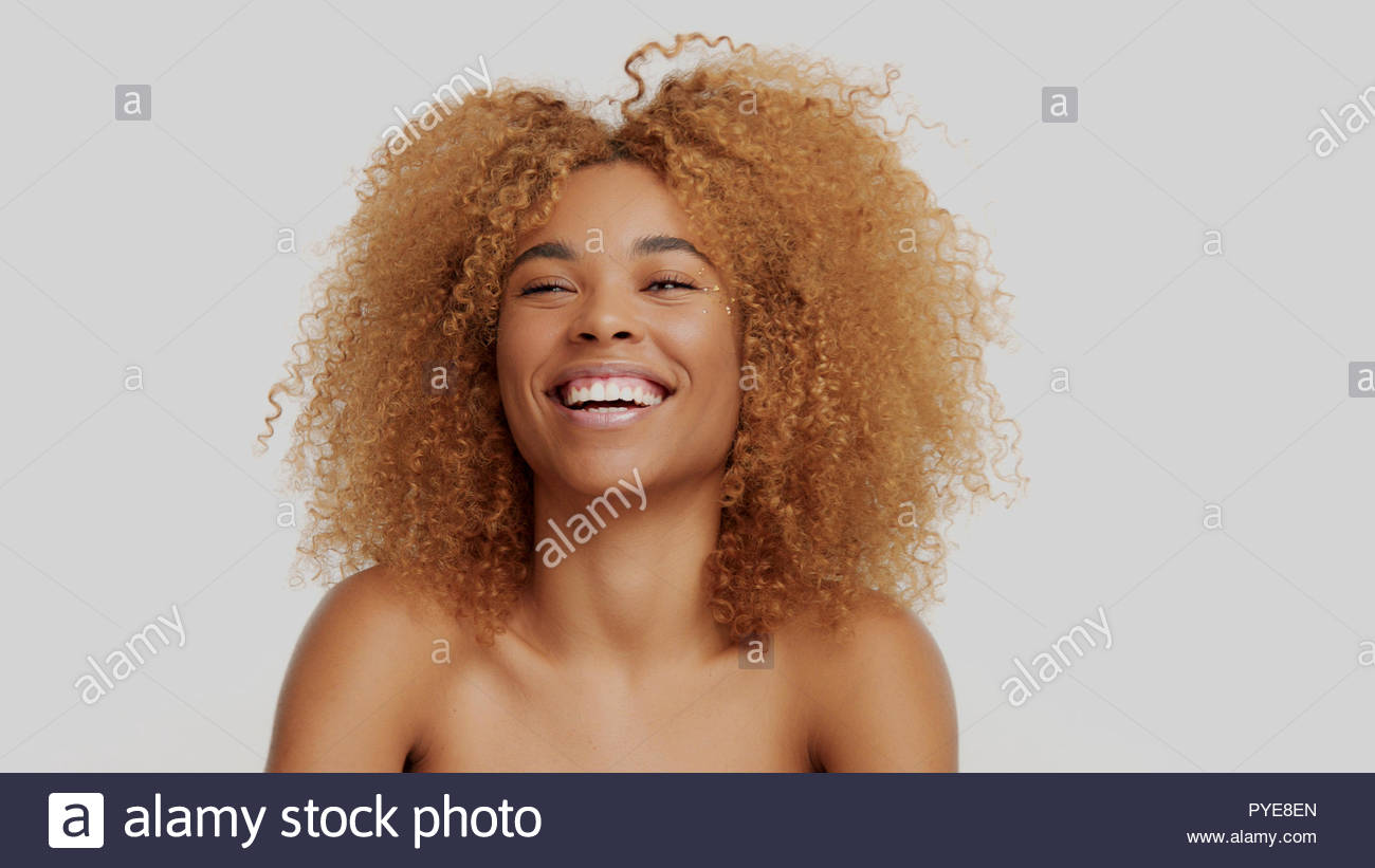 Mixed Race Black Blonde Model With Curly Hair Stock Photo