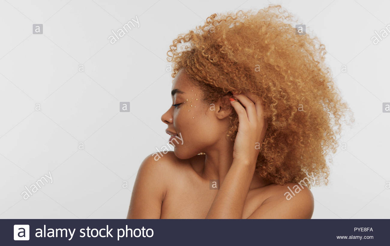 Mixed Race Black Blonde Model With Curly Hair Stock Photo