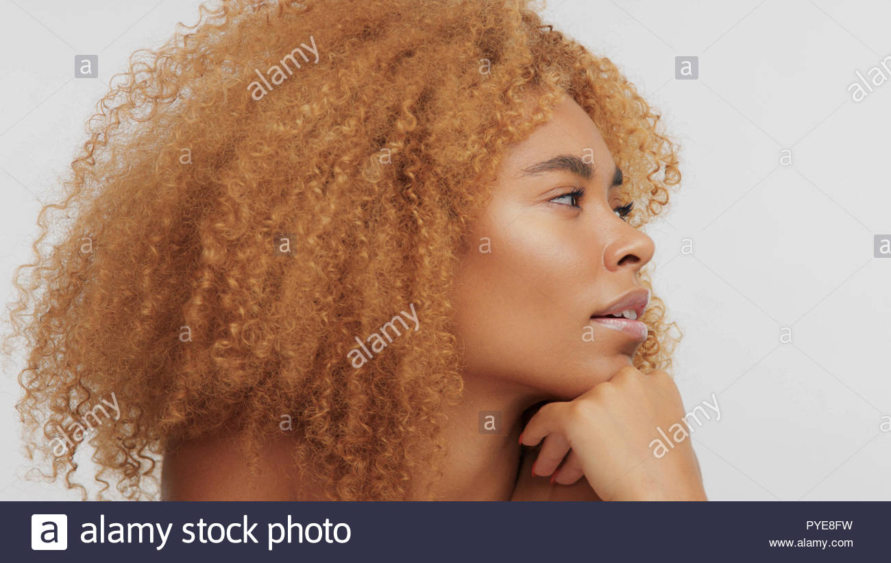 Mixed Race Black Blonde Model With Curly Hair Stock Photo