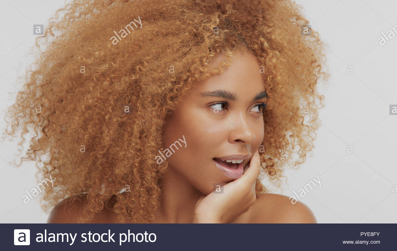 Mixed Race Black Blonde Model With Curly Hair Stock Photo