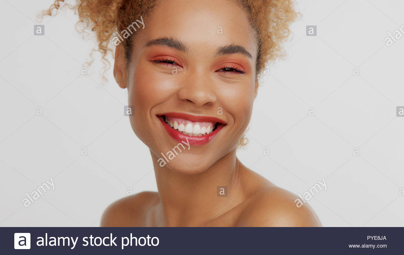 Mixed Race Black Blonde Model With Curly Hair Stock Photo