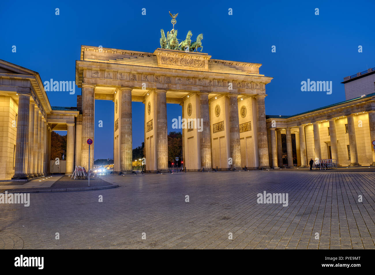 The famous illuminated Brandenburger Tor in Berlin at dawn Stock Photo