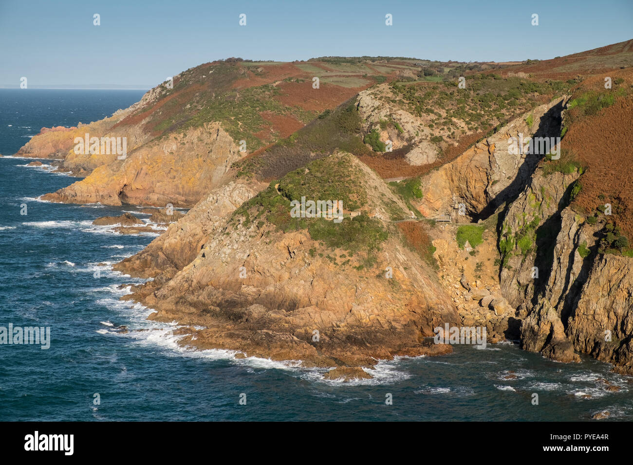 Rugged coastline at Crabbe on the North coast of Jersey , Channel Islands Stock Photo