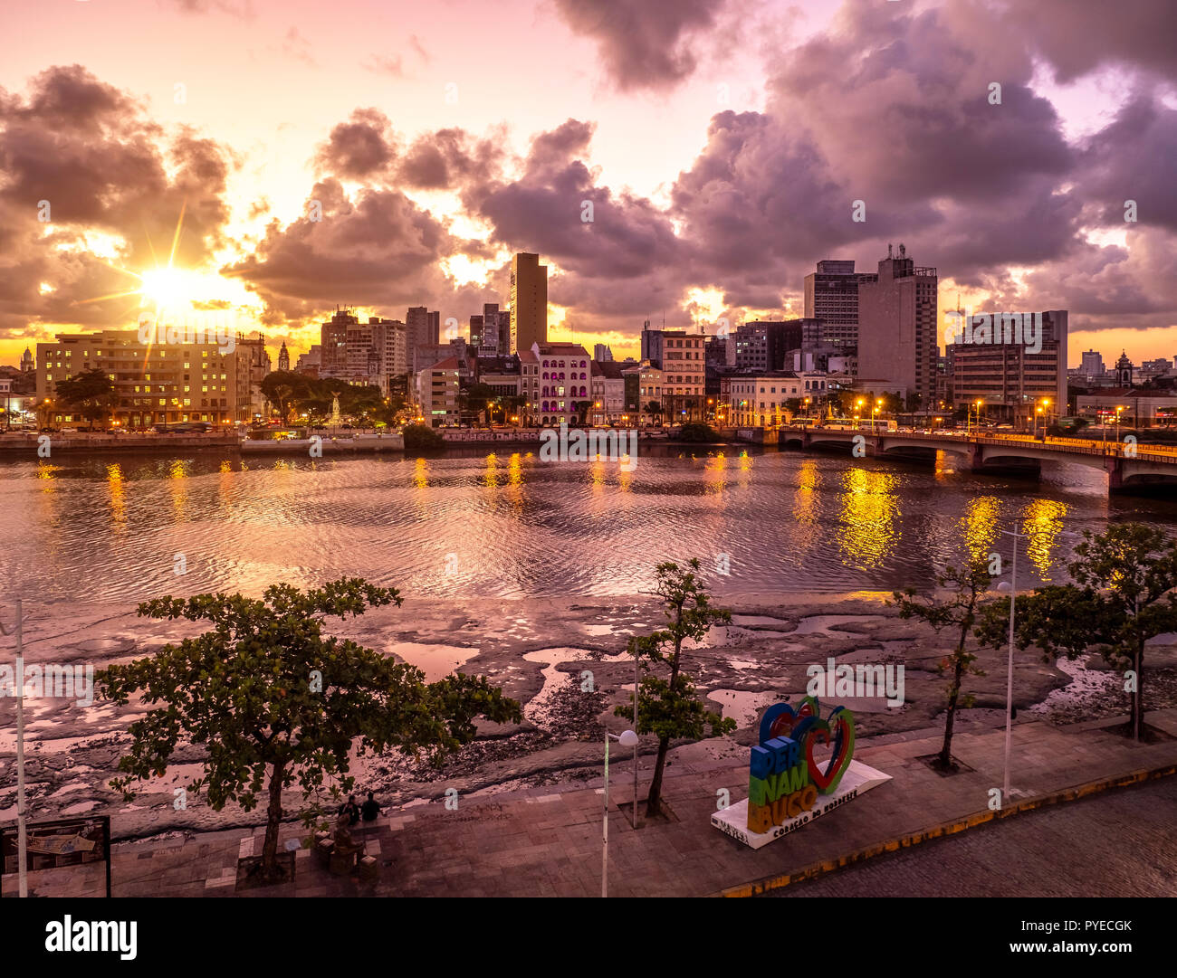 Recife in Pernambuco, Brazil by the Capibaribe river with colonial buildings and sunset. Stock Photo
