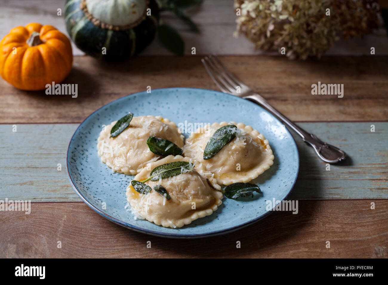 Pumpkin and ricotta ravioli with crispy sage, burnt butter sauce and