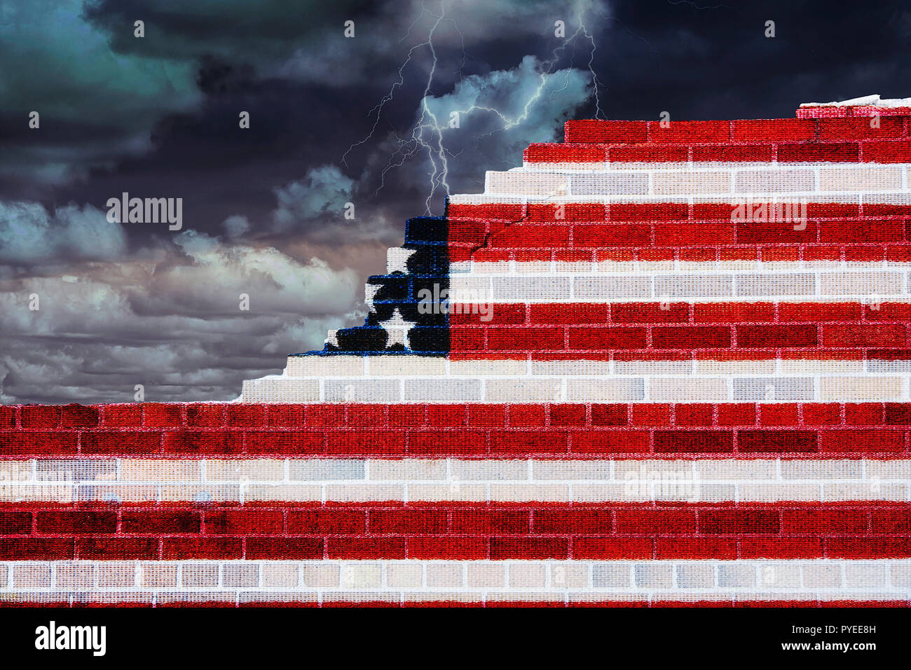 American flag on broken brick wall with stormy sky background Stock Photo
