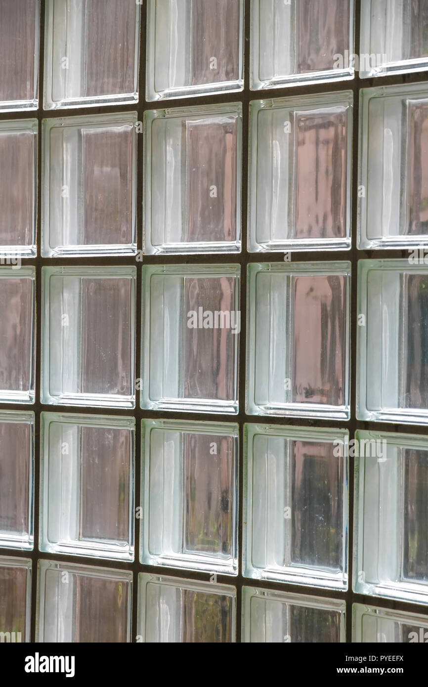 Closeup view on a wall made of glass tiles. Stock Photo
