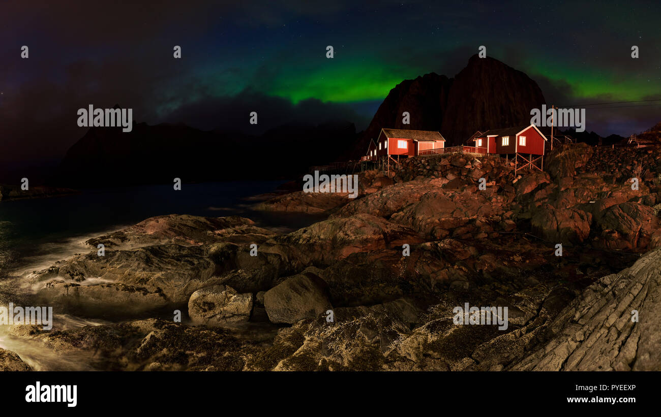 Panorama of romantic Fishing village in Norway - under Northern Lights Stock Photo