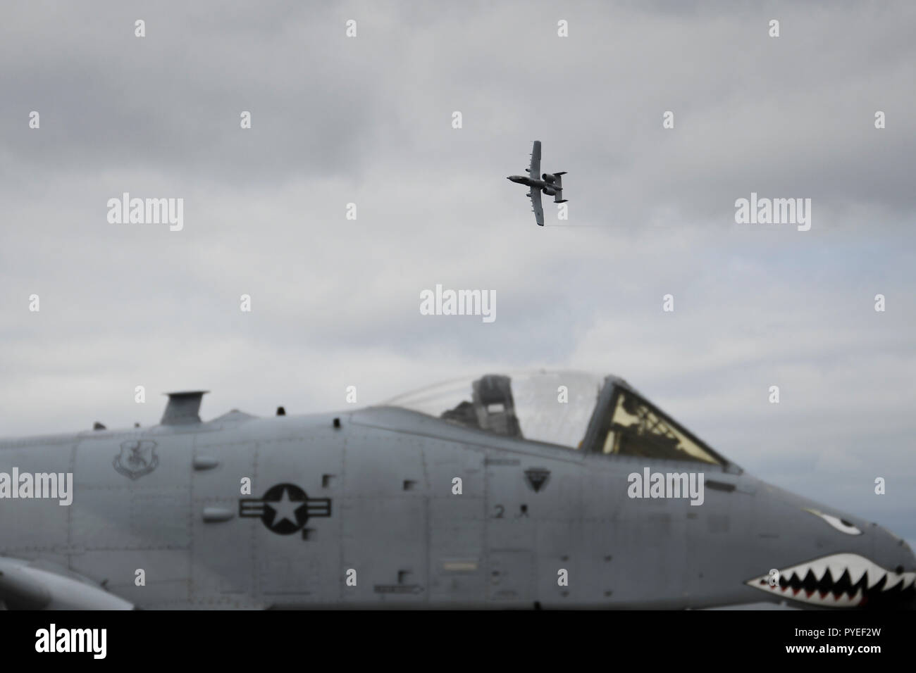 The A-10C Thunderbolt II Demonstration Team participates in an aerial demonstration at Hurlburt Field, Florida, Oct. 26, 2018. During the event, 12 aircraft from across the Air Force participated in an aerial demonstration in honor of Master Sgt. John Chapman, a combat controller who made the ultimate sacrifice during an intense battle in the mountains of Afghanistan. Chapman was posthumously awarded the Medal of Honor on Aug. 22, 2018. (U.S. Air Force photo by Senior Airman Dennis Spain) Stock Photo