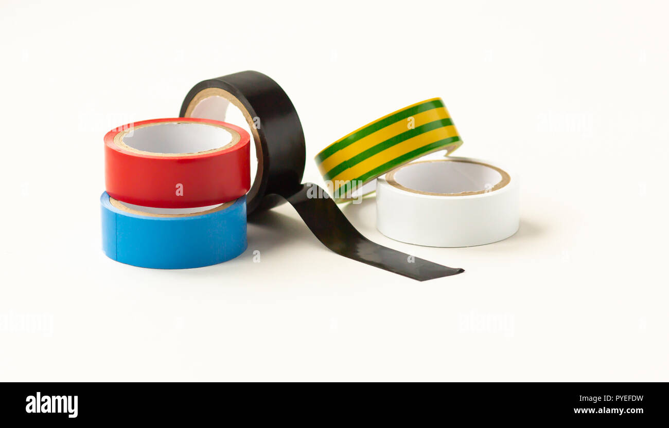Many colored electrical tapes on a white background Stock Photo
