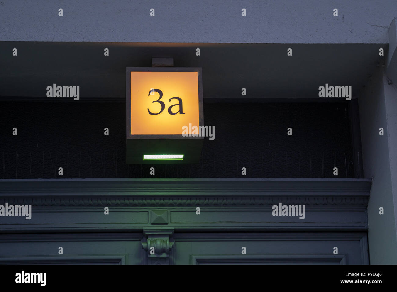 Yellow Illuminated House Number 3a Stock Photo - Alamy