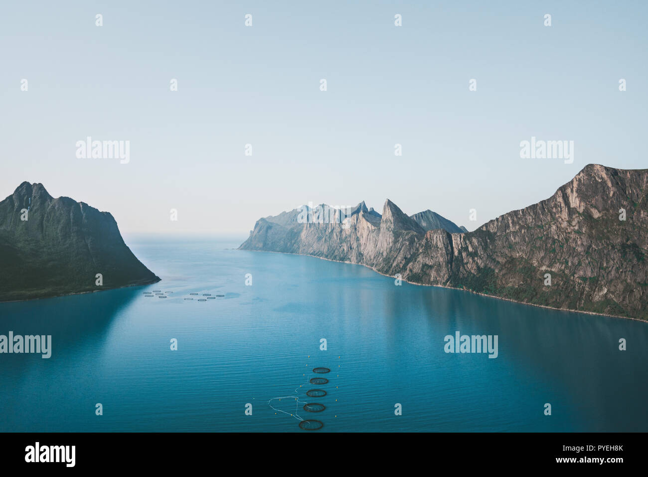 Mountains and sea fjord landscape in Norway Travel idyllic summer scenery Senja islands aerial view Stock Photo