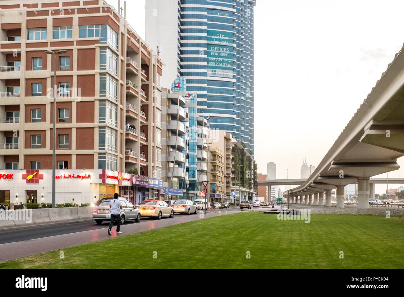 The raised tracks of the Dubai Metro running parallel to the Sheikh ...