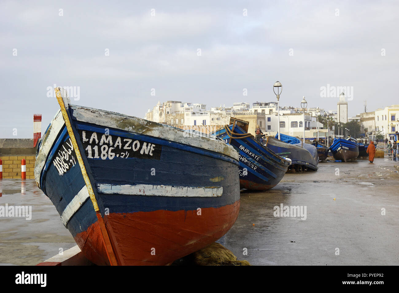 Wooden fishing boats in front of medina Essaouira, Morocco, Africa Stock Photo