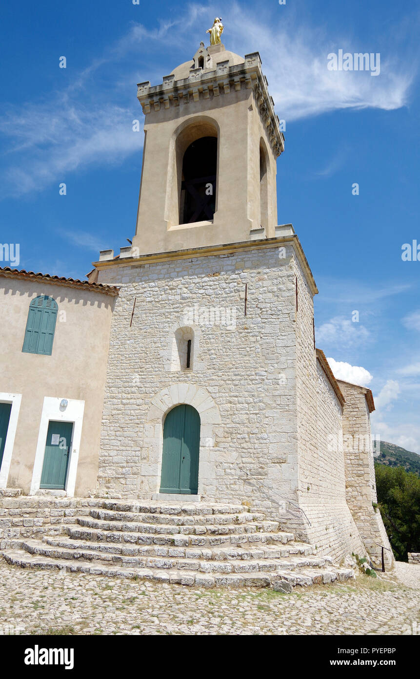 The small pilgrimage church known as Notre-Dale-du-Chateau d’Allauch on a steep hill above the small town of Allauch near Marseille Stock Photo