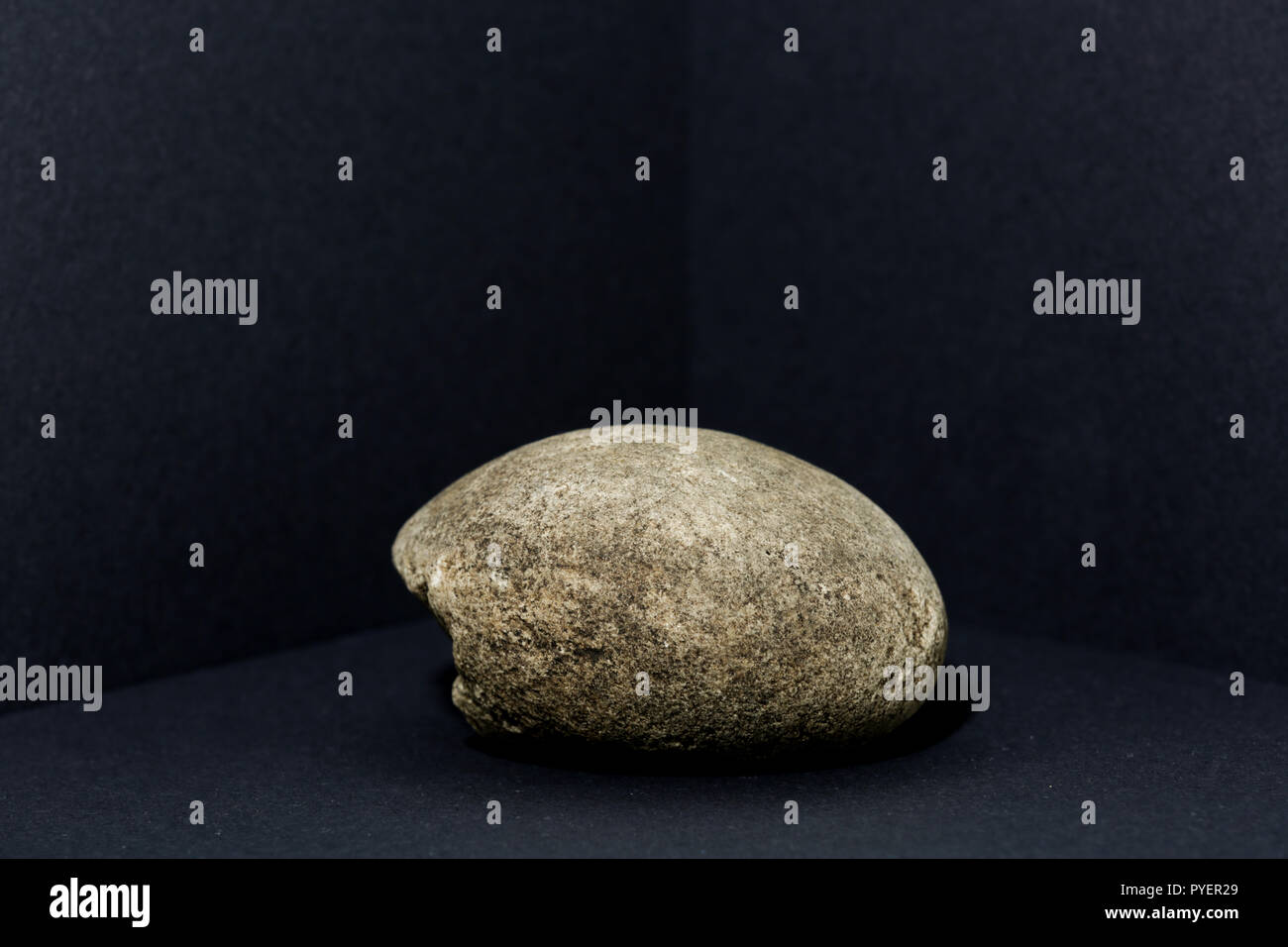 A pebble is a clast of rock with a particle size of 2 to 64 millimetres based on the Krumbein phi scale of sedimentology Stock Photo
