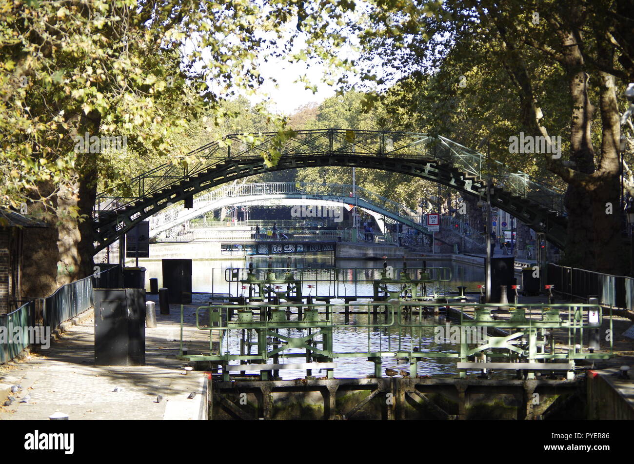 View of the Canal St Martin in Paris, France. Originally for water supply & an important traffic artery, now used by pleasure craft and tour boats Stock Photo