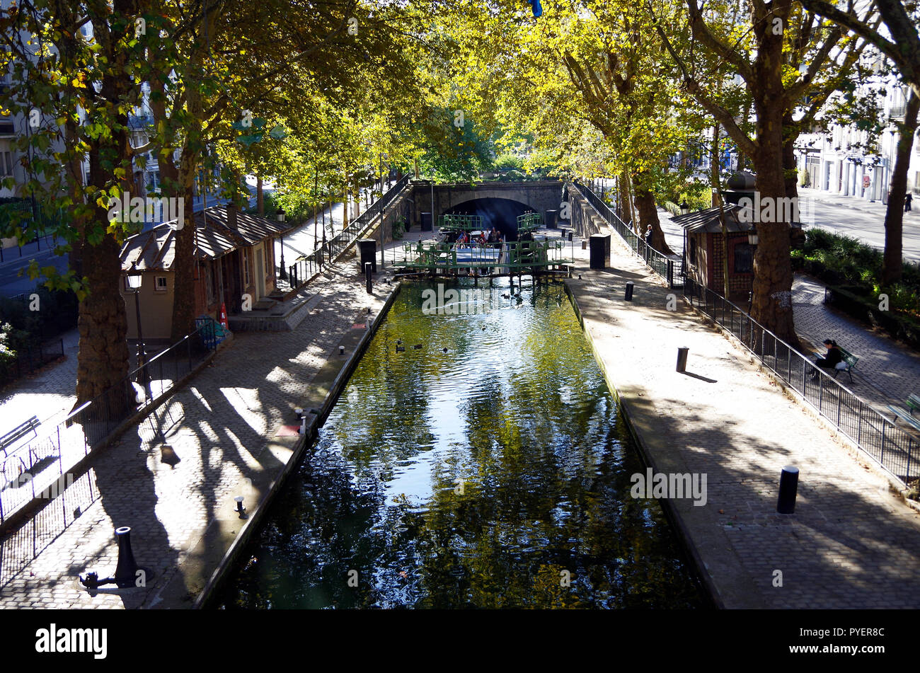 View of the Canal St Martin in Paris, France. Originally for water supply & an important traffic artery, now used only by pleasure craft & tour boats Stock Photo
