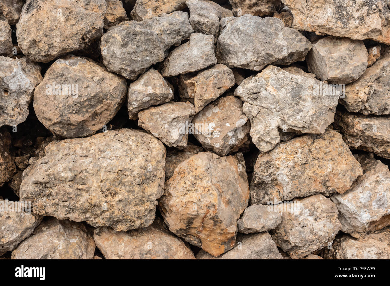 Seamless ashlar old Orange stone wall texture background. Horizontal Stock Photo