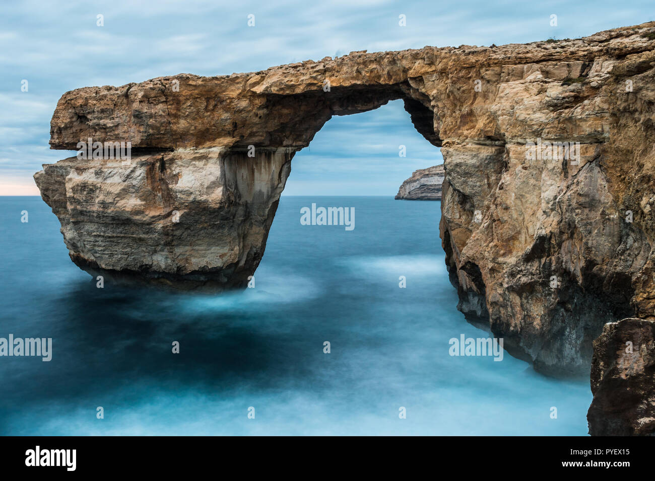 Seascapes of Dwejra Gozo Azur window, blue hole and inland sea Malta during winter with long exposure Stock Photo