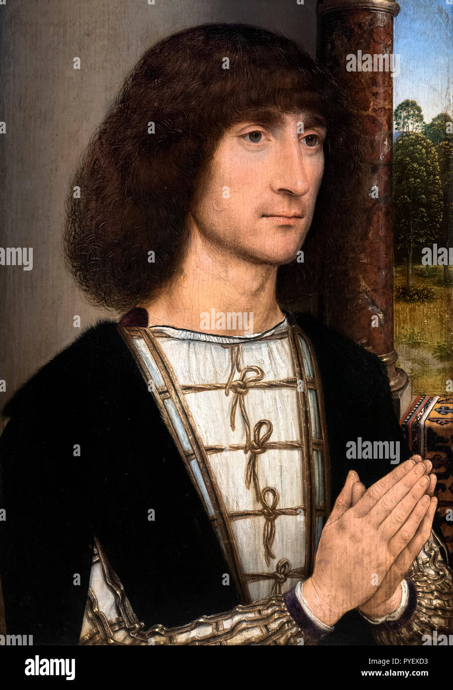 Portrait of a Young Man Praying by Hans Memling (c.1430-1494), oil on panel, 1485 Stock Photo