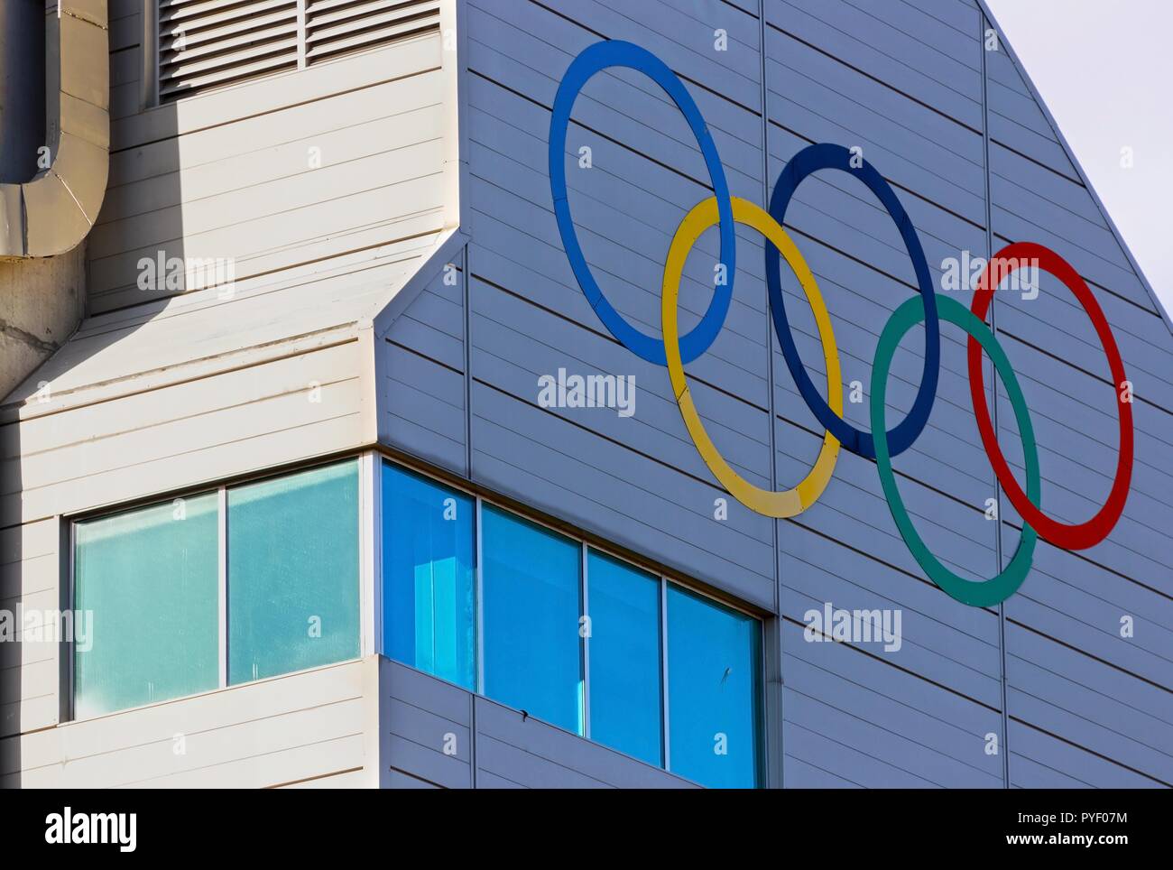 Five Olympic Rings Logo Painted on Wall of Ski Jumping Tower in Canada Olympic Park (COP) in City of Calgary, Alberta Stock Photo