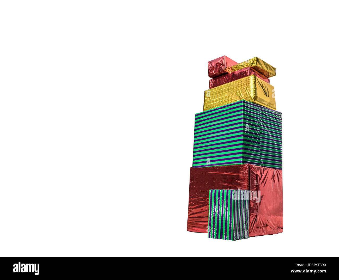 Stack of wrapped gift boxes in green, red and gold on a white ...