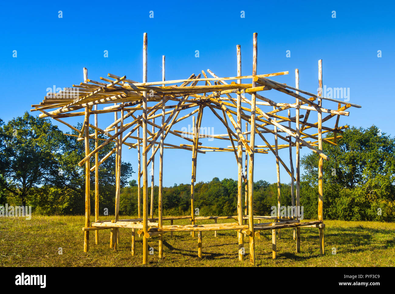 New traditional rustic shelter (for picnics) in field - France. Stock Photo